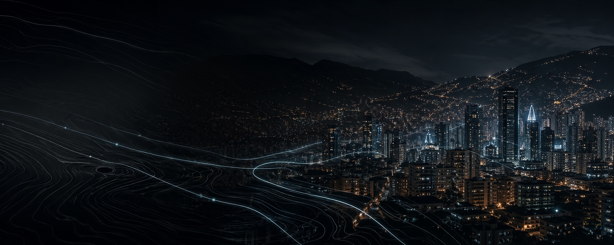 Panorámica nocturna de Medellín con líneas envolventes